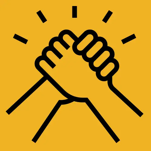 Deux mains qui se serrent en signe de soutien et d'unité, symbolisant la solidarité et la coopération pour un monde meilleur.